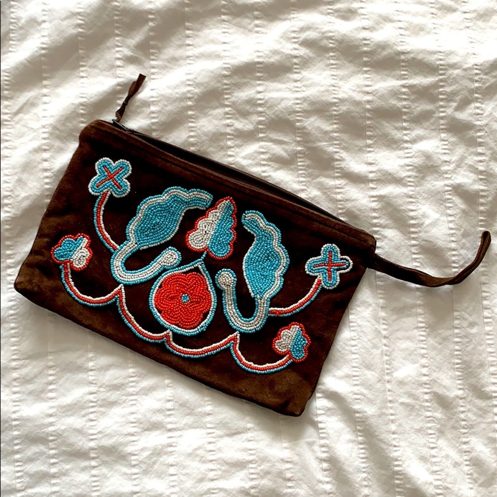 Antik Batik suede beaded clutch.